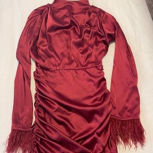 Red feathered long sleeve dress from prettylittlething